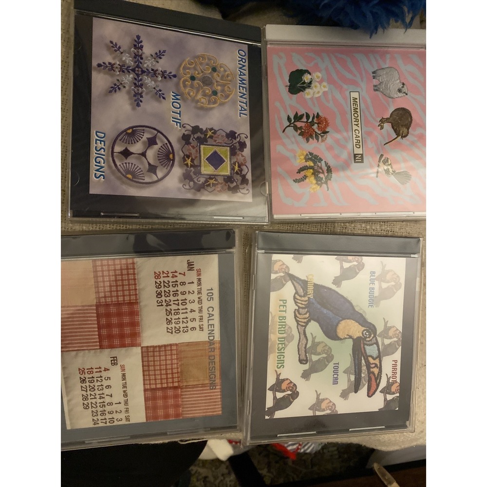 Lot Of 4 Janome Embroidery Calendar, Ornamental Motif, Pet Bird, New Zealand